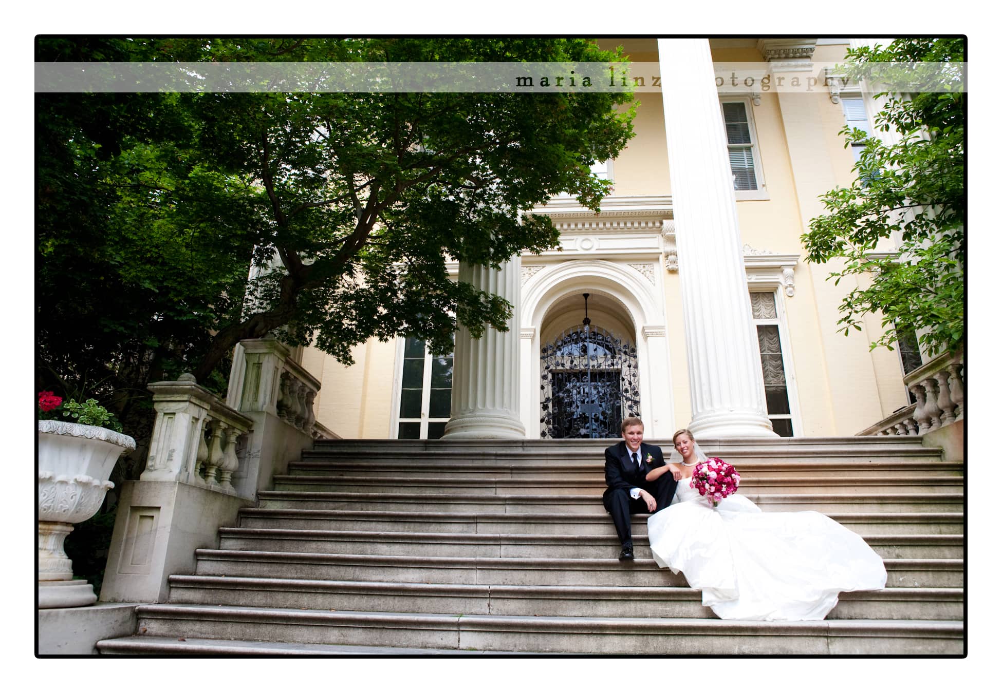 Laura & Brad on the steps of The Evergreen Hosue